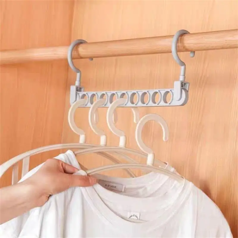 1 pz Nine Hole Magic Hanger creativo Multi Functional Hanger Household Internet popolare Magic Storage artefatto