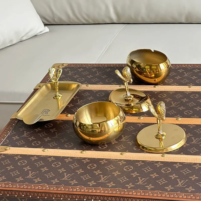 

High luxury private collection, Rolls-Royce, pure brass, bright gold metal ashtray cigar tank, living room office decoration