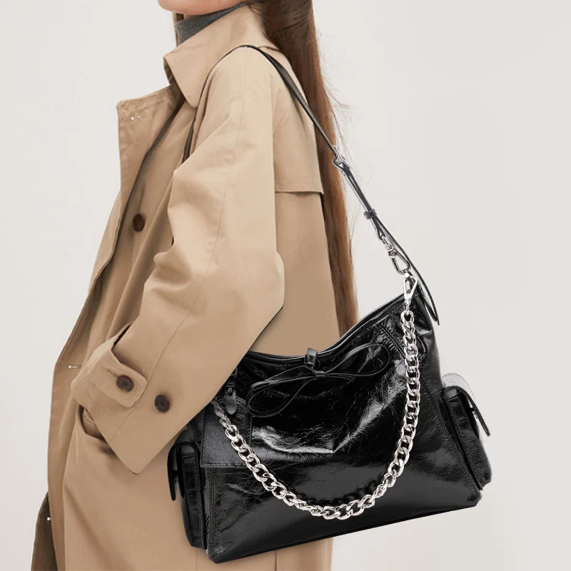 

Aidrani New trendy chain bag, women's underarm bag, made of cowhide material, can be worn on one shoulder or crossbody