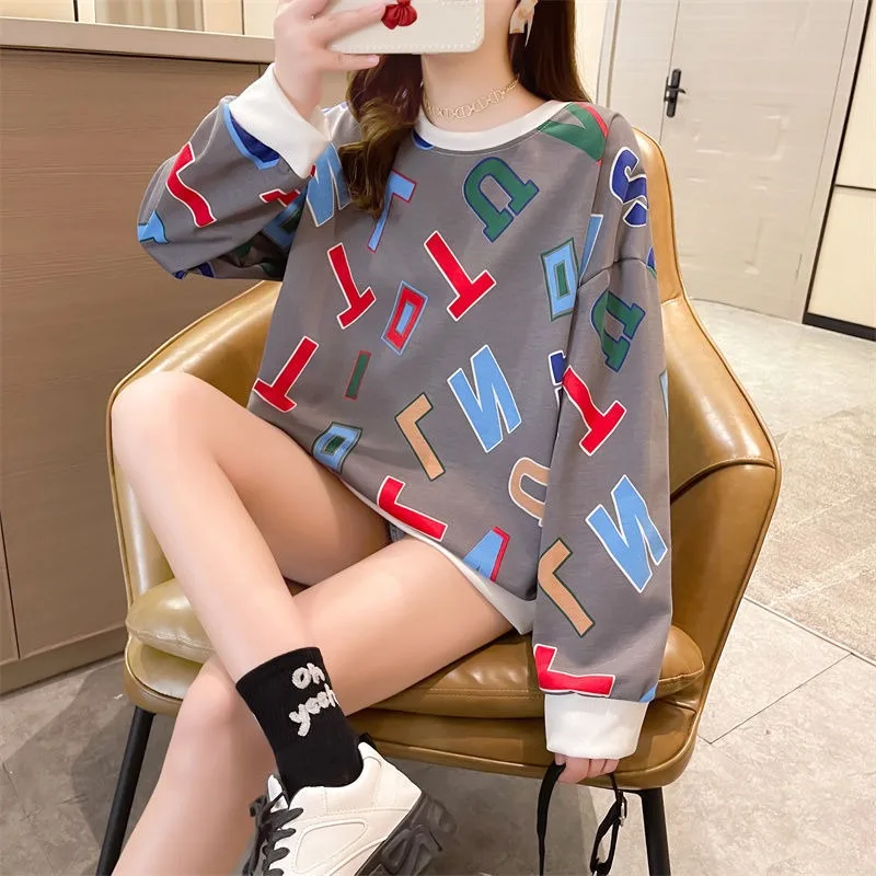 Début de l'automne nouvelle Collection à manches longues col rond lettre de dessin animé imprimé polyvalent, simple et confortable, haut de niche