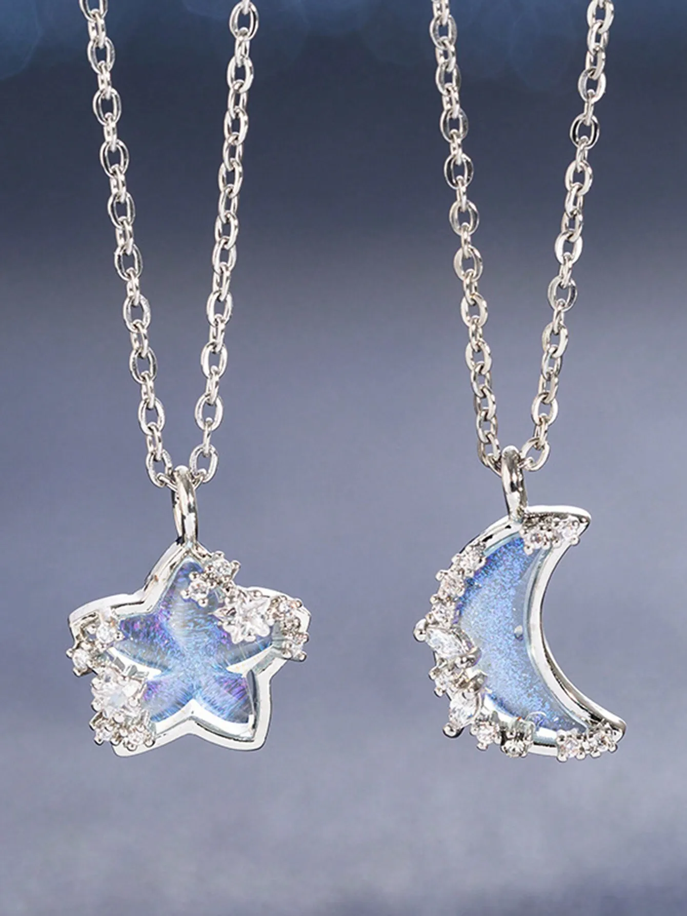 

2pcs Star and Crescent Moon Pendant Necklaces with Iridescent Resin and Crystal Accents