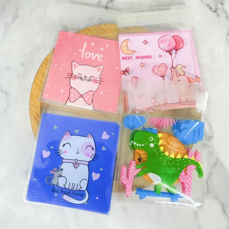 Mini sacs OPP de dessin animé, sacs cadeaux auto-adhésifs chat dinosaure pour bricolage bijoux biscuits emballage stockage sacs en plastique