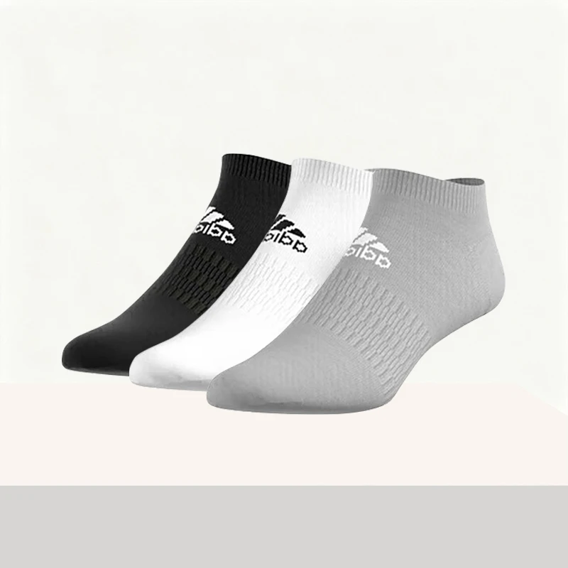 

adidas Stylish,versatile, comfortable,durable,lightweight,and moisture-wicking—unisex in black, white, and gray.Model DZ9400