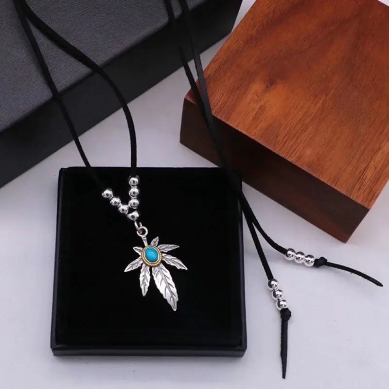 Japanese S925 pure silver feather maple leaf pendant Indian style gold flying eagle silver cake men's and women's pendant