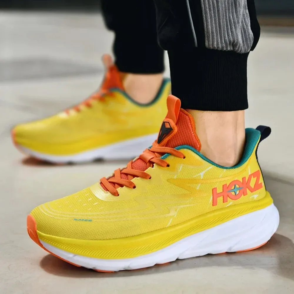 أحذية الجري الجديدة للرجال والنساء أحذية الجري القابلة للتنفس خفيفة الوزن أحذية المشي أحذية رياضية فاخرة للجيم