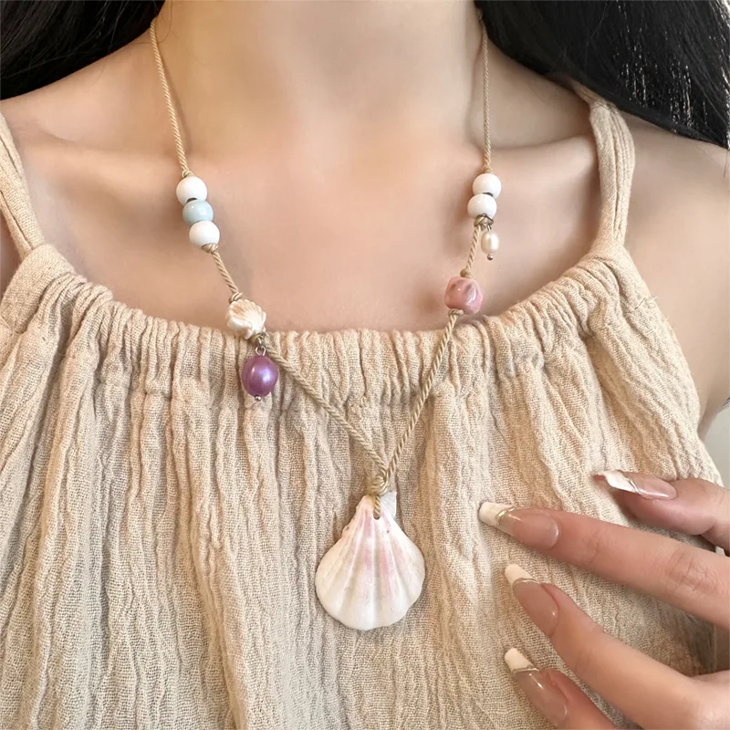 

Seaside vacation style woven rope shell necklace, women's summer high-end temperament, design sense, niche accessories