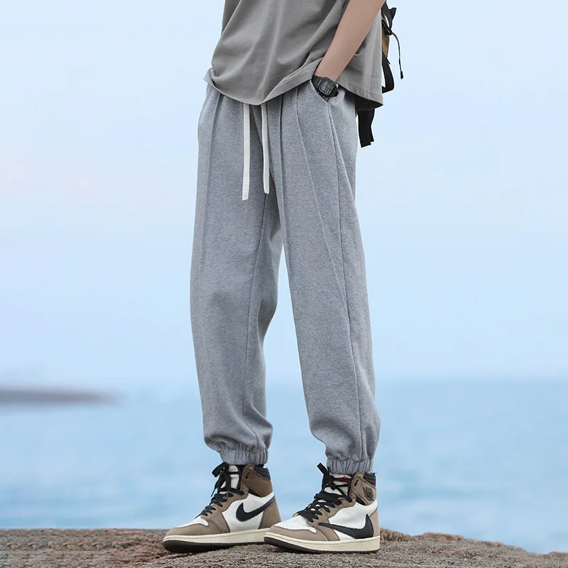 

Мужские повседневные спортивные брюки свободного кроя для весны и лета, молодежные дышащие брюки с карманами, средней посадкой, базовые цвета, модные