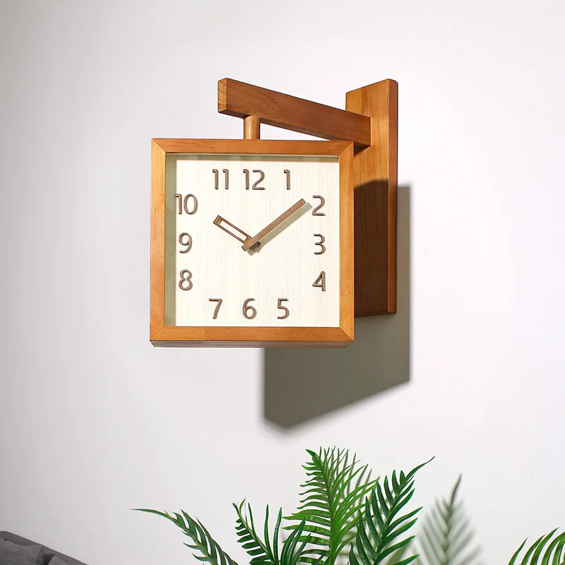 

Solid wood double-sided silent wall clock. Simple and modern Japanese style wall mounted clock with two sides at the corner