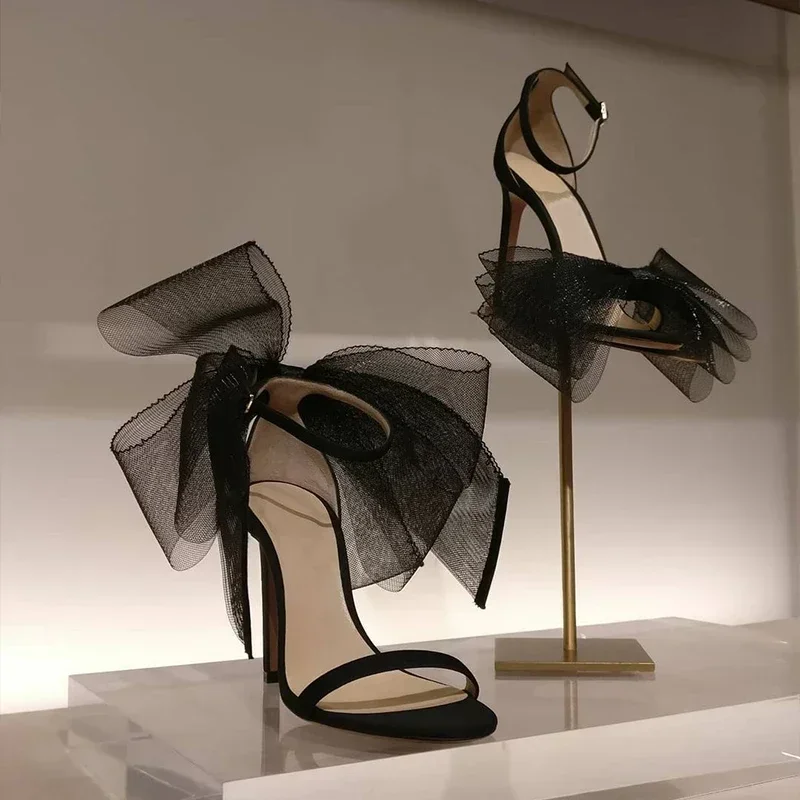 

New asymmetrical bow sandals for summer 2025, sexy one-piece strip with exposed toes, slim heel high-heeled shoes