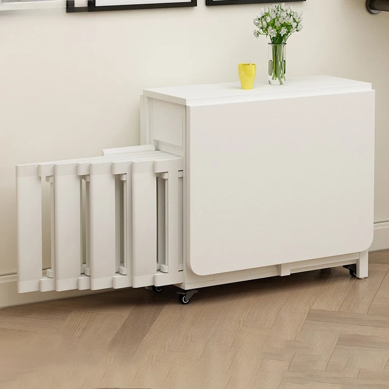 

The folding dining table is easy to retract and multi-functional small apartment household dining table can be stored