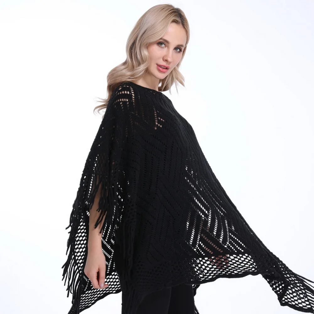 

Womens Lightweight Boat Neckline Poncho Loose Sweater Tassels Top with Fringed Sides and Hollowed Patterns Dropshipping