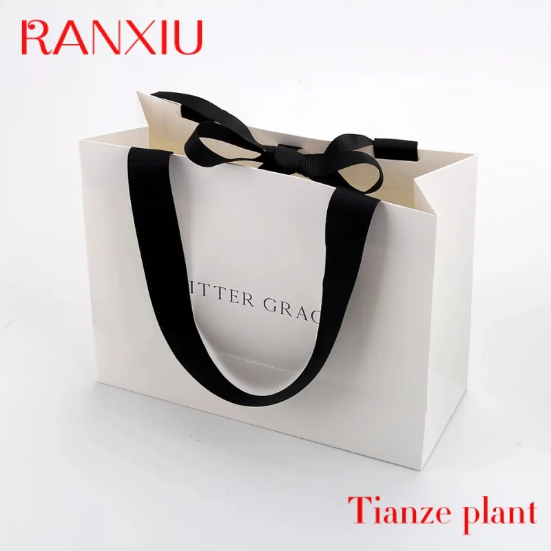 

Custom Custom Printed Paper Bags Cardboard Luxury White Kraft Paper Gift Bag With Ribbon Handle For Shopping Bag With Your Own L