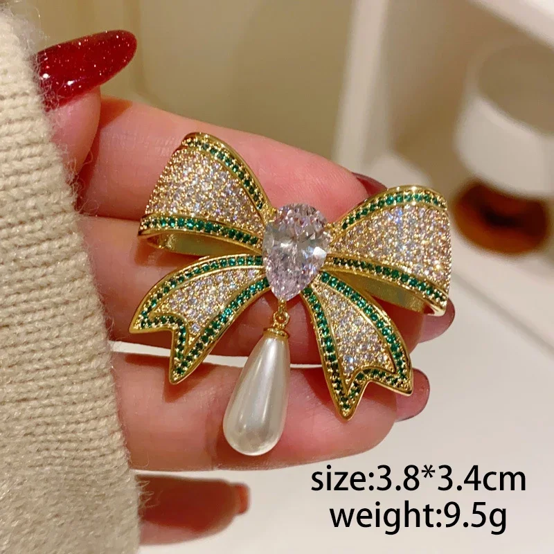 الكلاسيكية Bowknot على شكل بروش للنساء موضة فاخرة حجر الراين Bowknot دبابيس دبابيس مجوهرات اكسسوارات هدايا الحفلات 2025