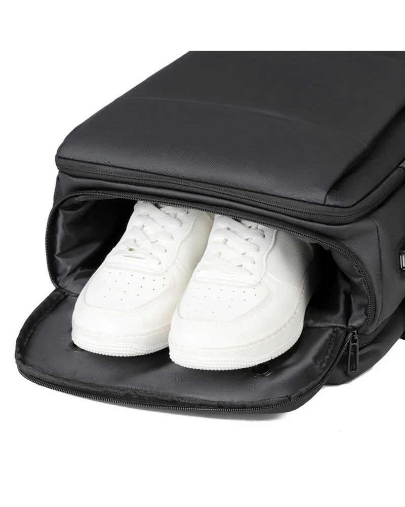 

Expandable men's backpack with dedicated shoe compartment built for short business trips and work
