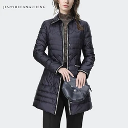 Chaqueta de plumón negra de longitud media para mujer, Cuello de camisa de manga larga, adornos de correas, Abrigo acolchado Delgado elegante, chaquetas cálidas a prueba de viento, Invierno