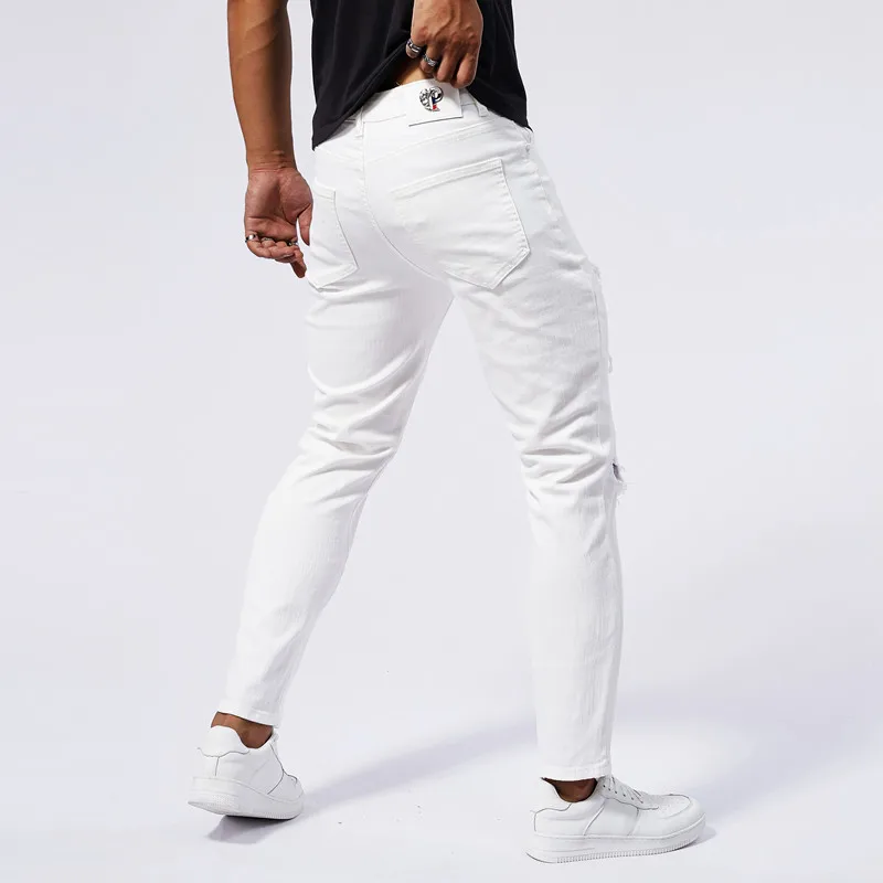 Pantalones vaqueros blancos con parche de cobre roto para hombre, pantalones largos de pierna pequeña ajustados y elásticos, moda urbana, verano,
