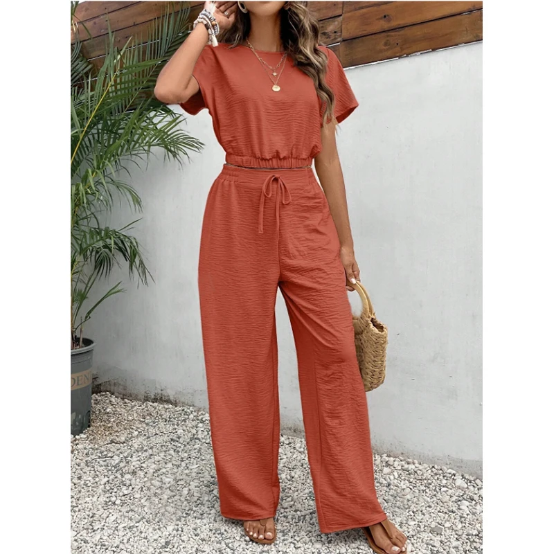 Chic elegante Set di due pezzi per donna Top corto con bottoni sul retro + pantaloni lunghi con coulisse Set completo da donna estivo da donna da