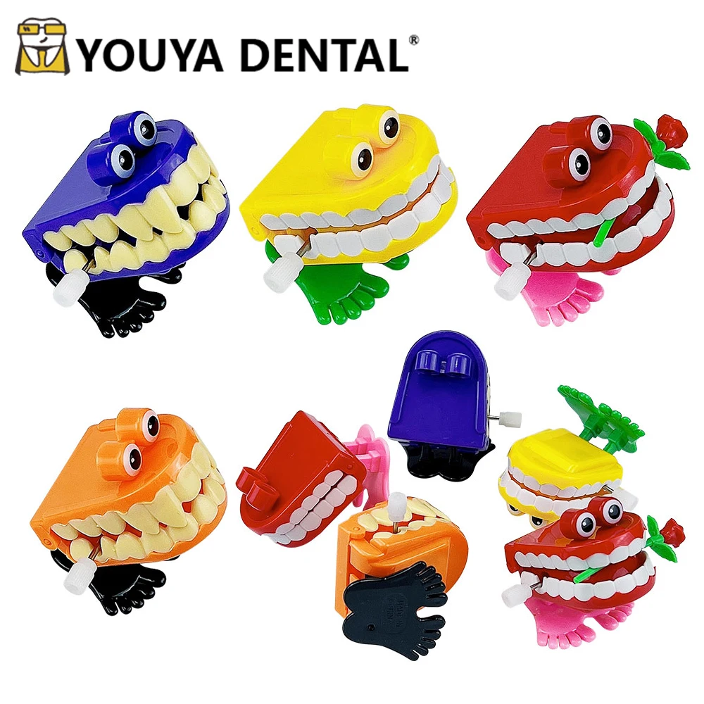 50/100pcs Tooth Shape Clockwork Toy Mini Funny Cute Walking Children Jump Teeth Running Clockwork Spring Wind Up Toy Kid Gift