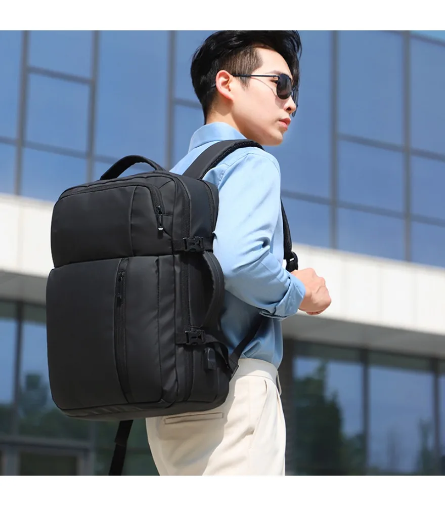 

Dark gray expandable laptop backpack with side buckles anti splash multi compartment for men office commute business travel