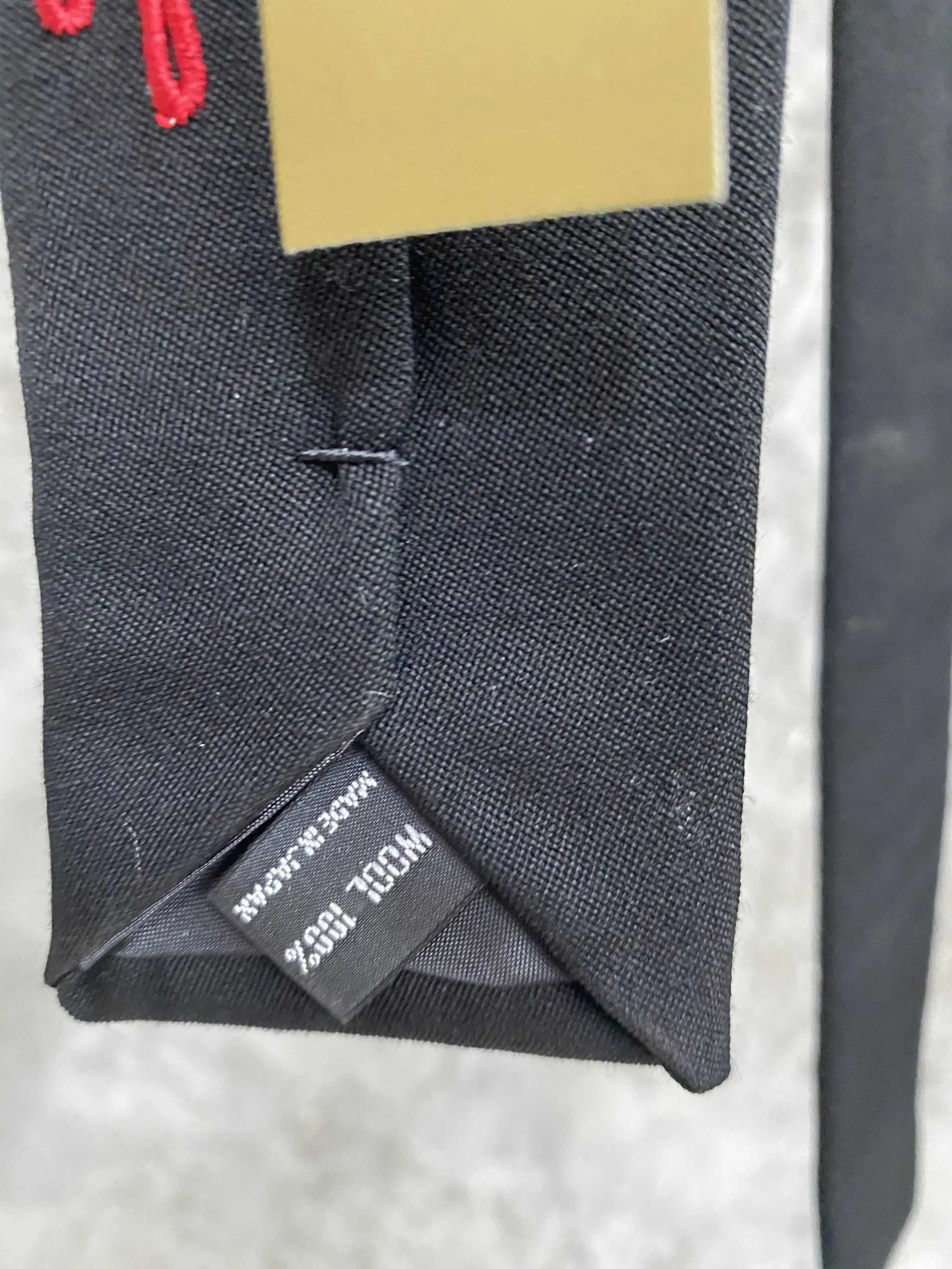 Krawat męski TOP-YAMAMOTO, japoński oryginał, styl dark, wełna, haft z pająkiem kolczastym.