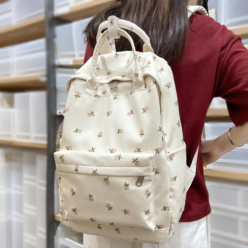 Mochila bonita con estampado Floral para mujer, morral escolar con estampado Kawaii para ordenador portátil o universidad, a la moda