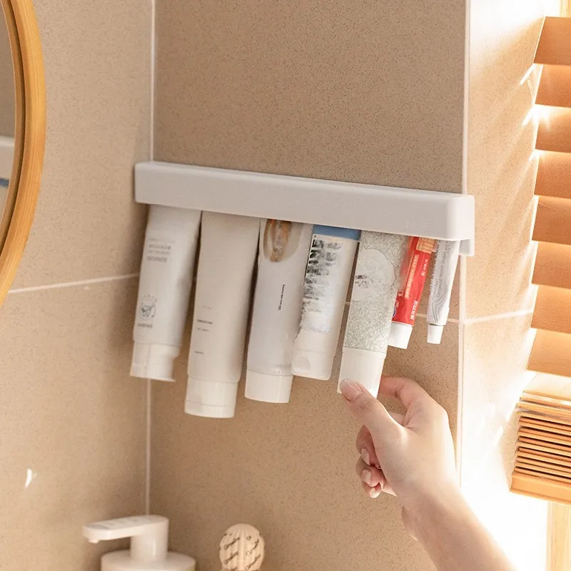 Toothpaste Holder and Facial Cleanser Wall Rack Wall Mount Bathroom Storage Rack For Household Use No Punching Toothpaste Clip