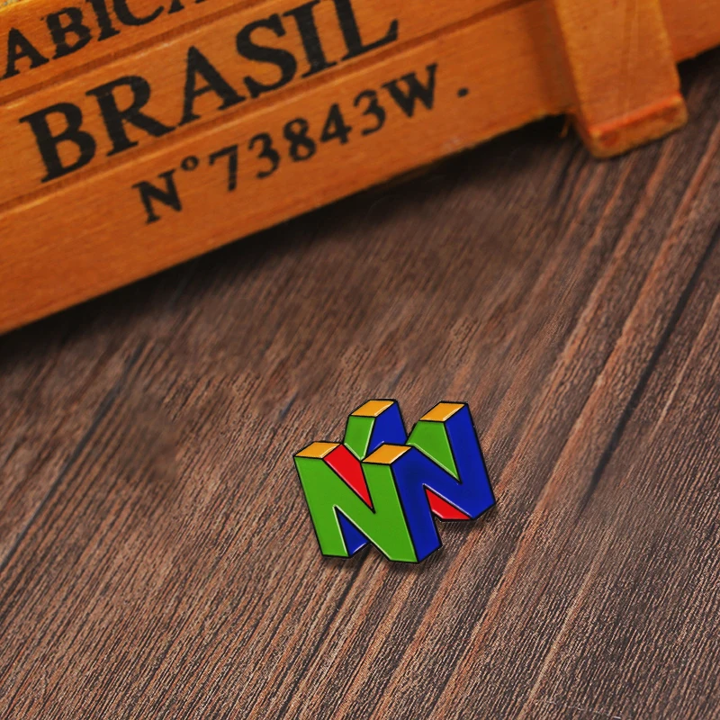 Retro arcade logo brooch