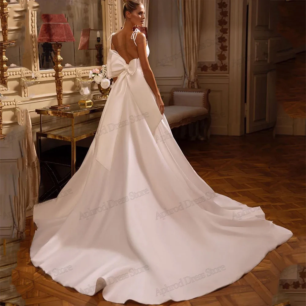 Klasyczne suknie ślubne ładne suknie ślubne kokardka zdobią szaty o linii na formalne przyjęcie elegancka satynowa suknia balowa Vestidos De Novia