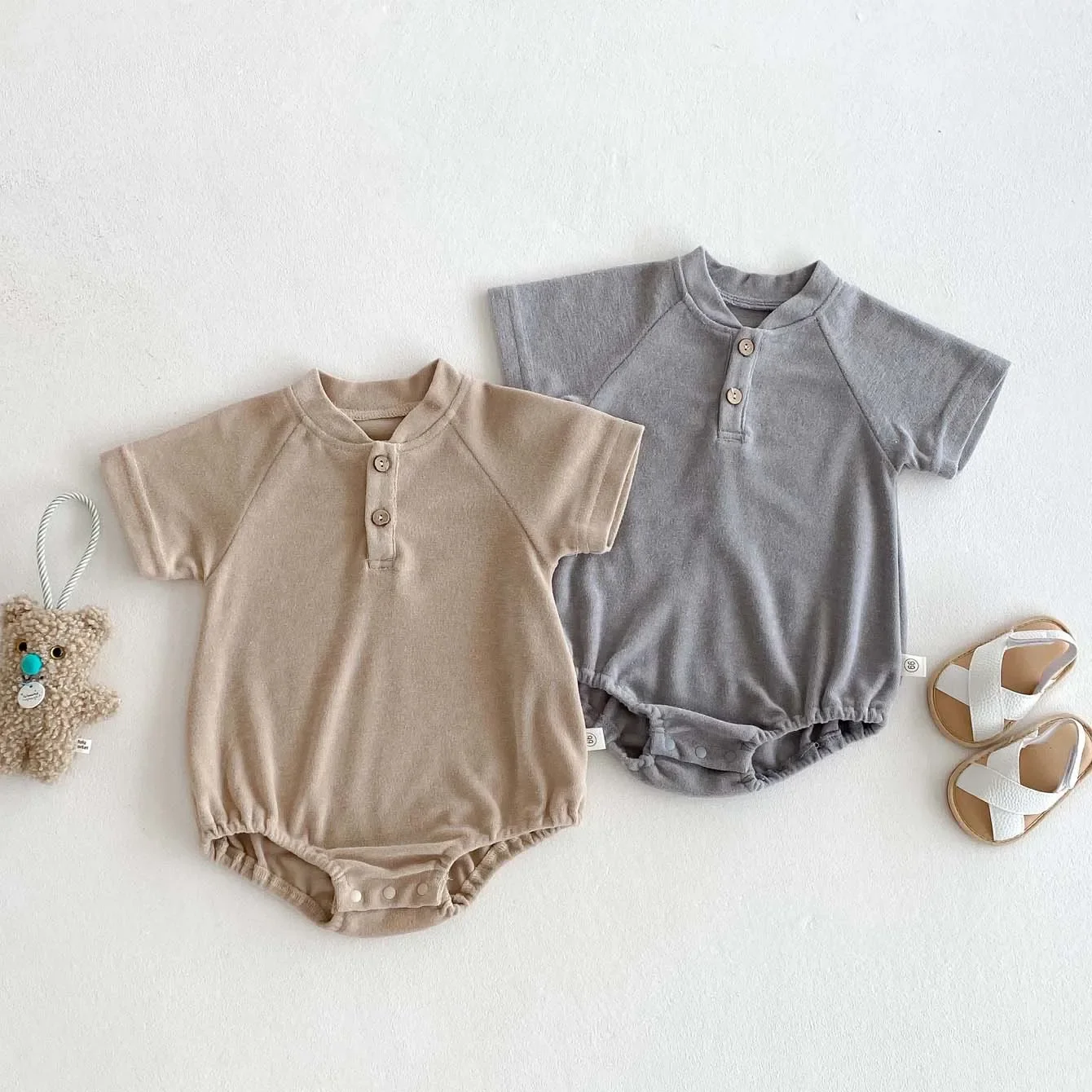 Spot male baby summer short sleeved net color bag fart jacket 2025 new baby open chest V-neck jumpsuit cross-border