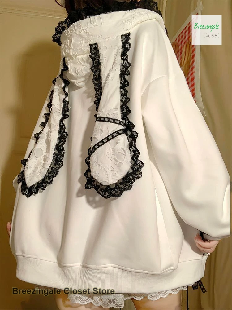 

French light Asian wind cute lace rabbit ears sweater women spring and autumn design sense niche sweet soft sister hooded coat.