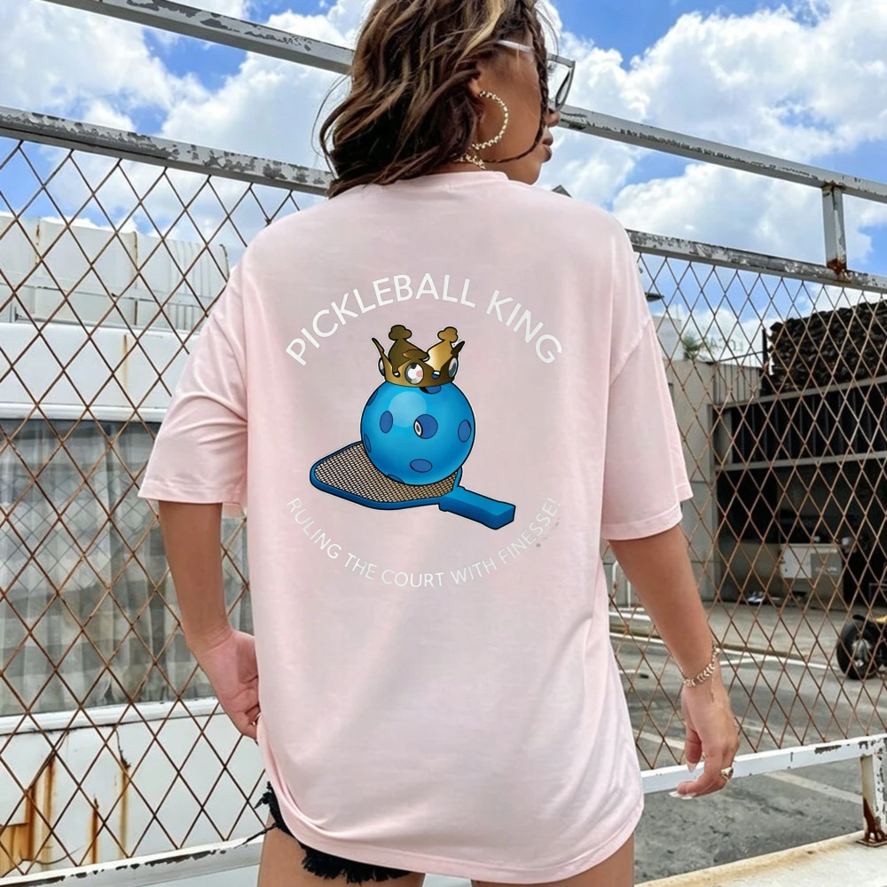 With Pickleball Ball Crown Paddle King Text Court Phrase Blue Ball Gold Crown White Text Pink Shi Short Sleeve Cotton T-Shirt