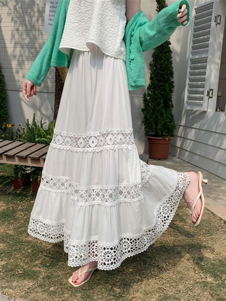 Boho oeillet dentelle broderie ourlet jupe longue d'inspiration vintage été a-ligne jupe à plusieurs niveaux avec taille élastique vacances à la plage