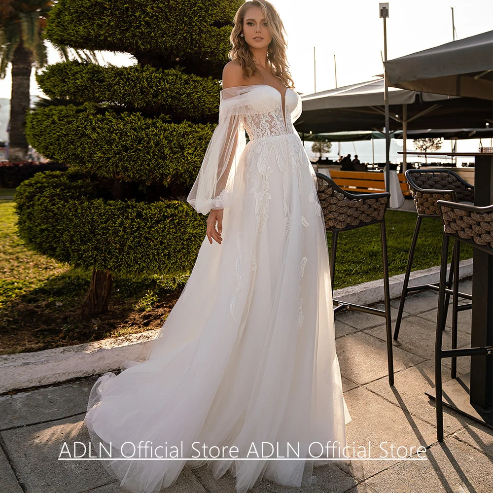 Prinses trouwjurken voor de bruid Op maat gemaakte afneembare pofmouwen Sweetheart kralen appliqué sweep trein bruidsjurk