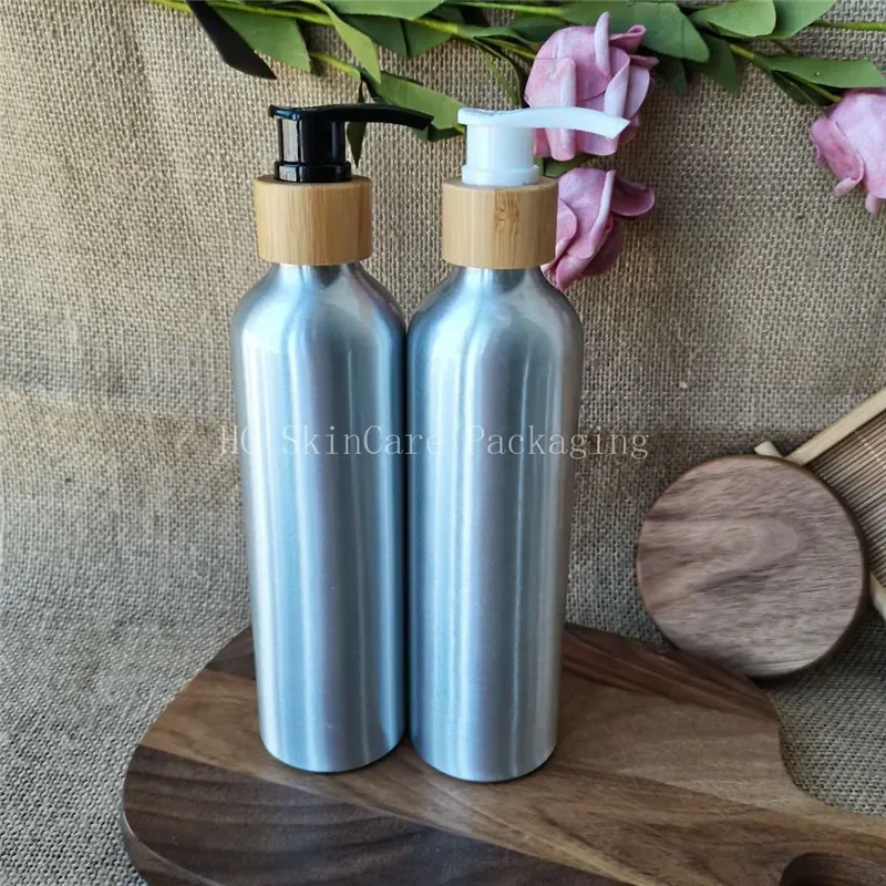

fashion design silver aluminum bottle with black/white bamboo top cap/bamboo lotion cap skin care，kitchen washing press bottle