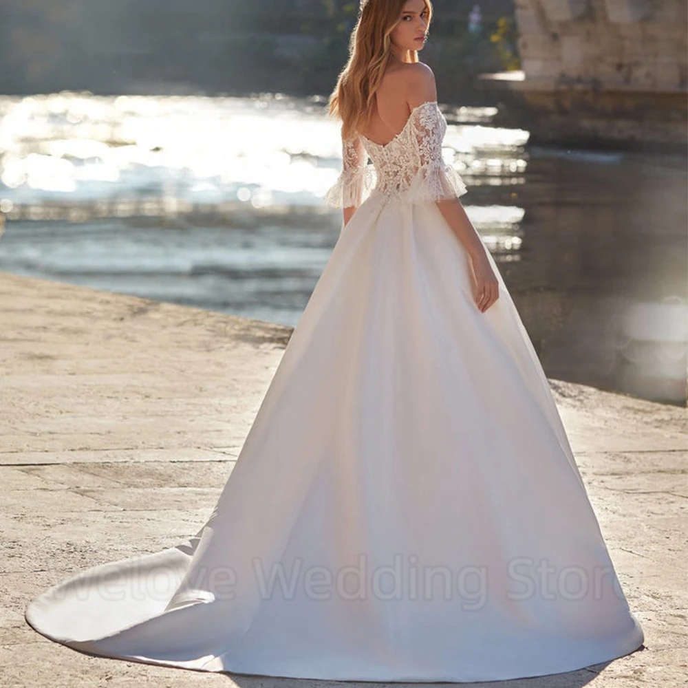 Off the Shoulder A-Line Wedding Dress Short Flare Sleeves with Applique and Pocket Floor Length Bridal Satin Sweep Train Gowns