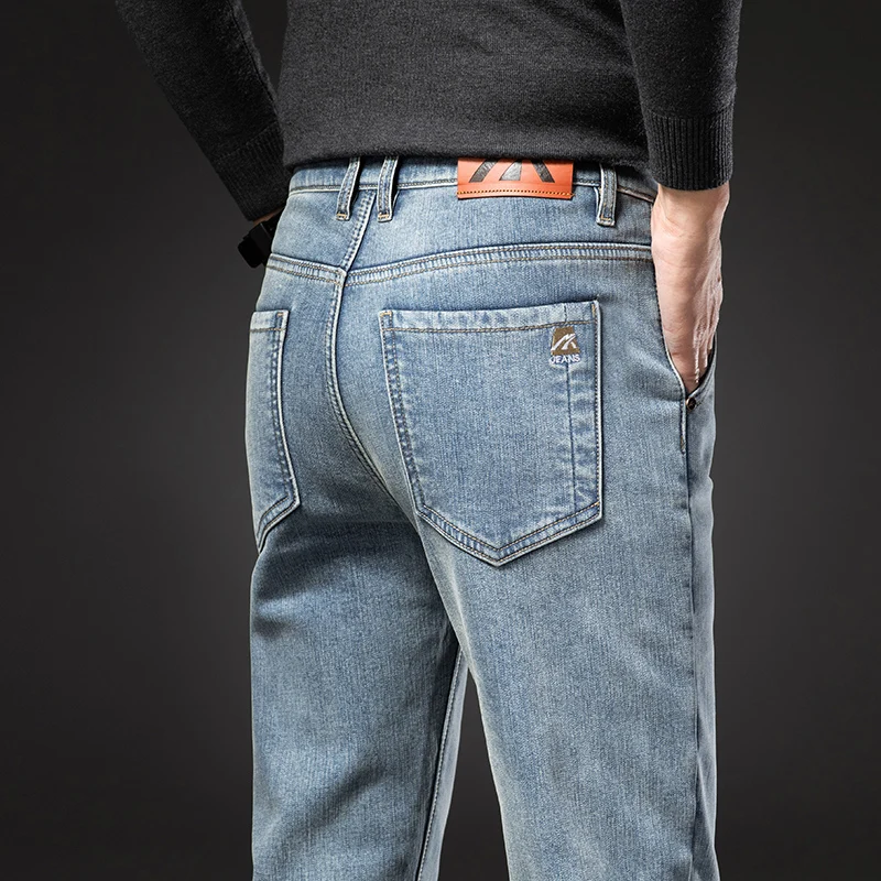 Inverno velo estiramento jeans para homens moda magro confortável algodão calças retas quentes roupas de marca masculina calças jeans