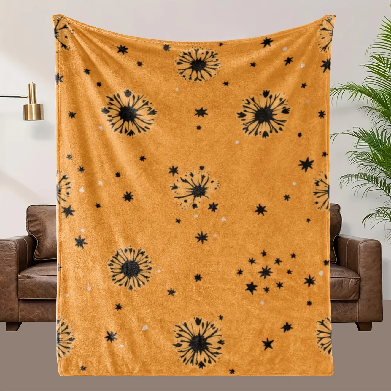 

Black floral and star pattern blanket, polyester fabric, machine washable, suitable for bedroom and living room décor.