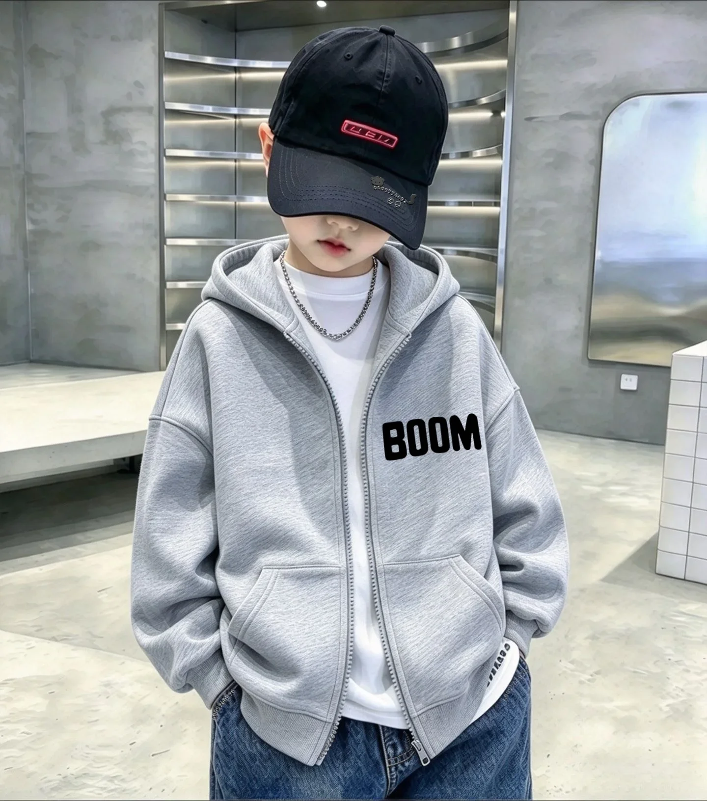 Children's hooded zip-up jacket featuring a minimalist "BOOM" graphic; suitable for both boys and girls in winter. 4