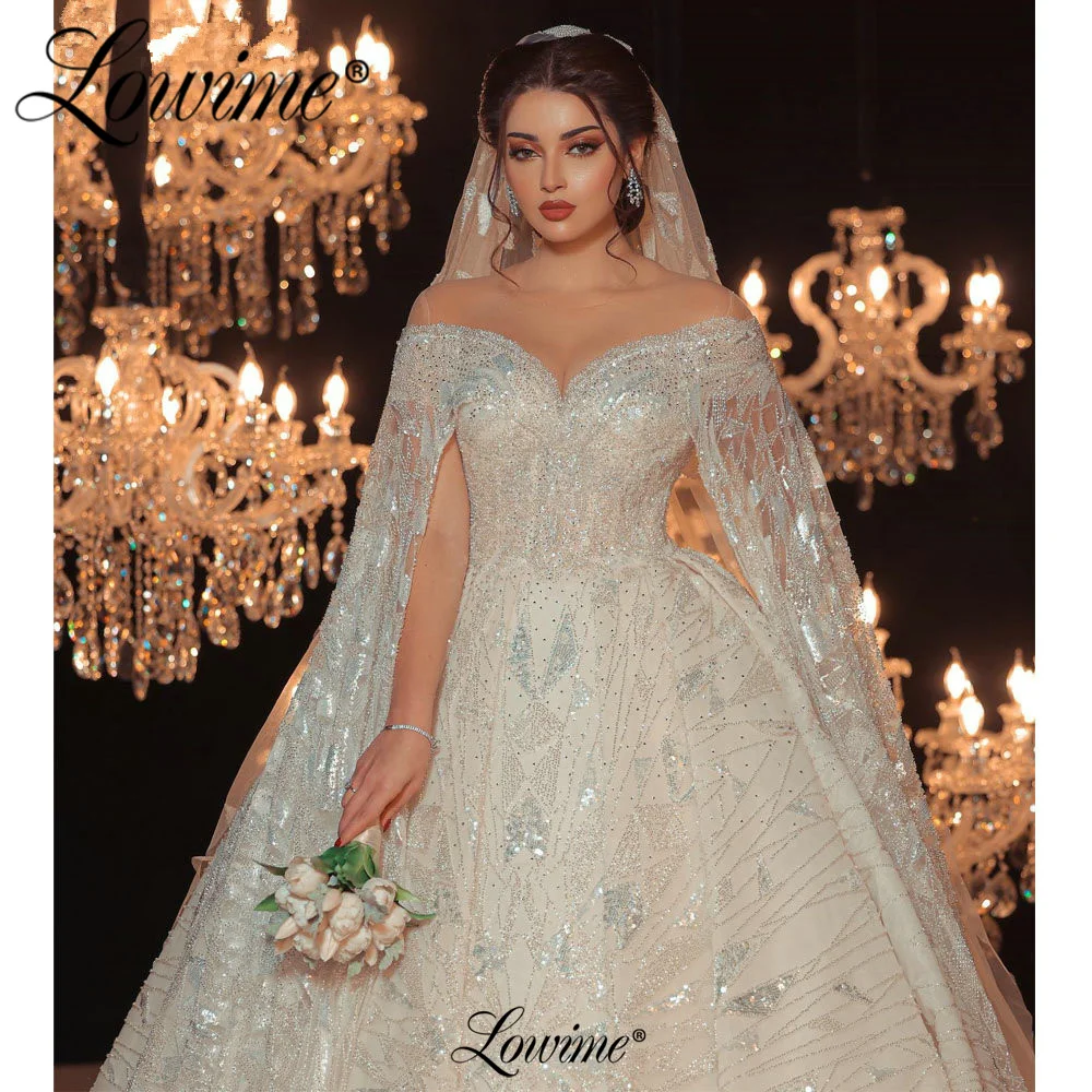 

Lowime Ball Gown Muslim Wedding Dresses 2023 Cape Sleeves Long Robe De Mariee Sequins Beaded Arabic Glitter Vestido De Novia