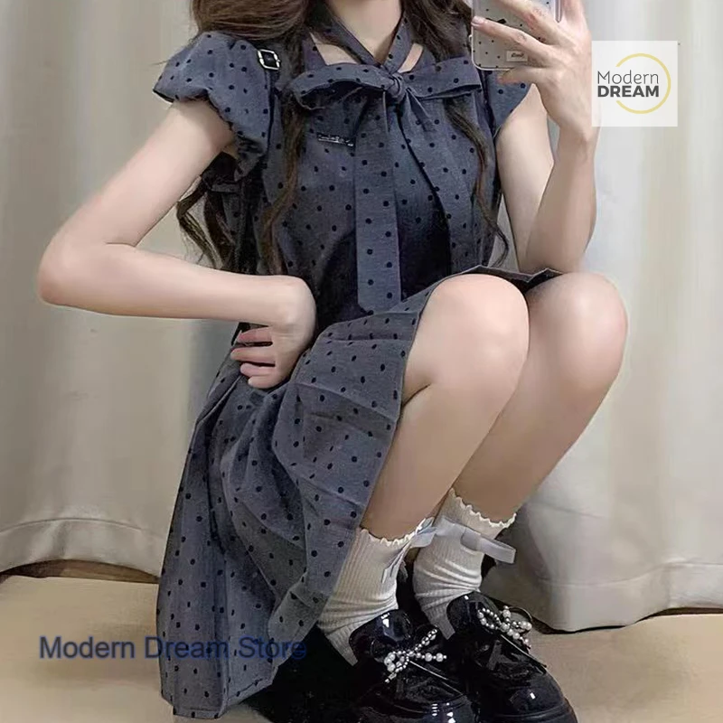 

French temperament socialite advanced wave point sleeveless dress female summer new sweet bow waist slim pleated skirt.