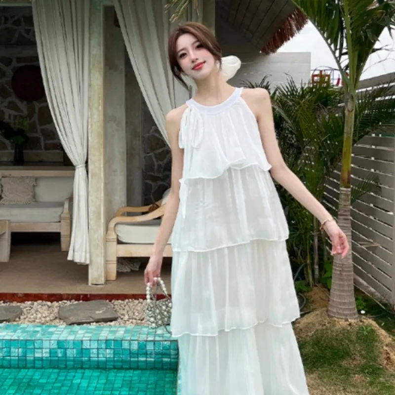 Vestido largo con cuello de temperamento francés para mujer, novedad de verano, vestido largo acampanado sin mangas con cuello redondo, vestido de vacaciones de Color sólido Fairycore