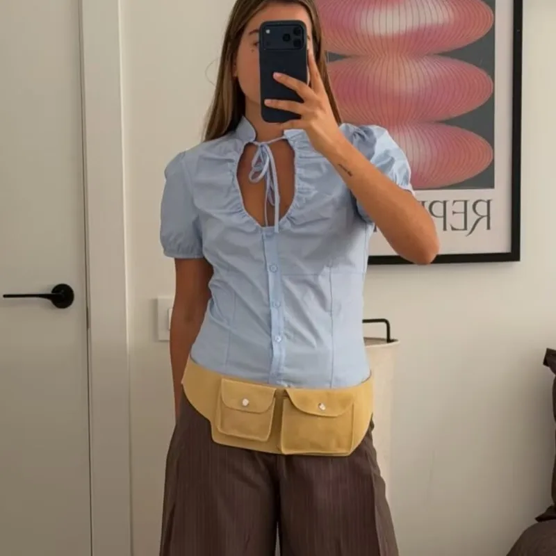 

2026 Sexy Blue Puff Short Sleeve Shirt Women Tie Neck Ruched Blouse Hollow Out Top Summer Elegant Blusas Mujer Casual