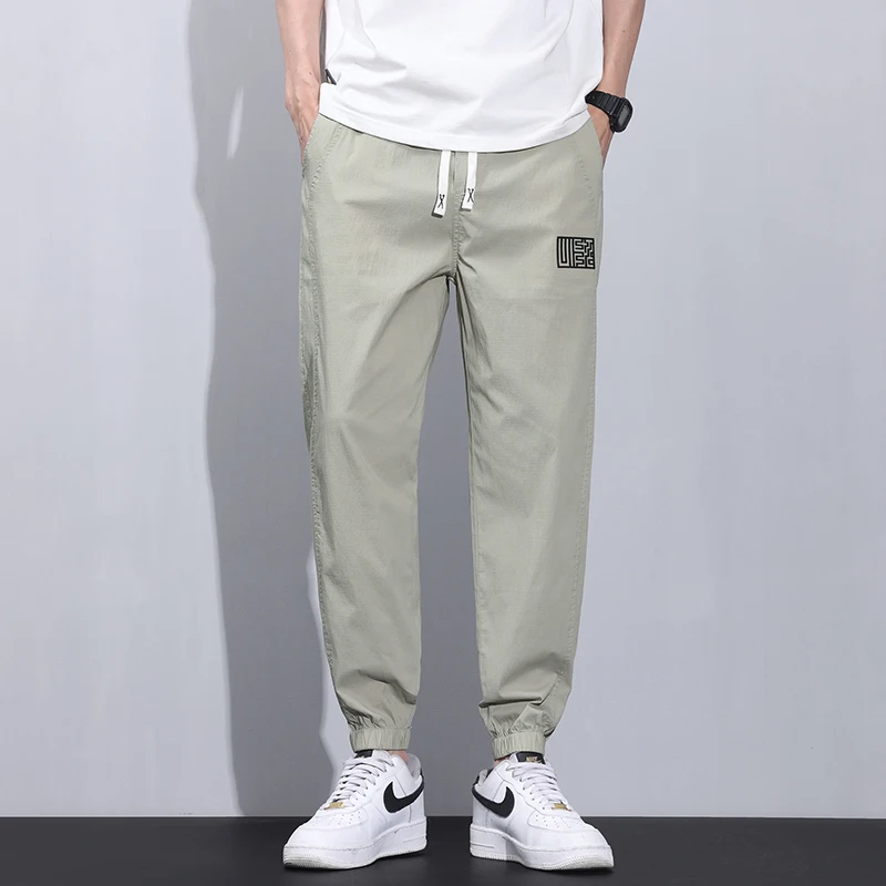 

Мужские летние повседневные брюки-карго свободного кроя с эластичным поясом на шнурке, однотонные джоггеры с множеством карманов, шаровары в уличном стиле