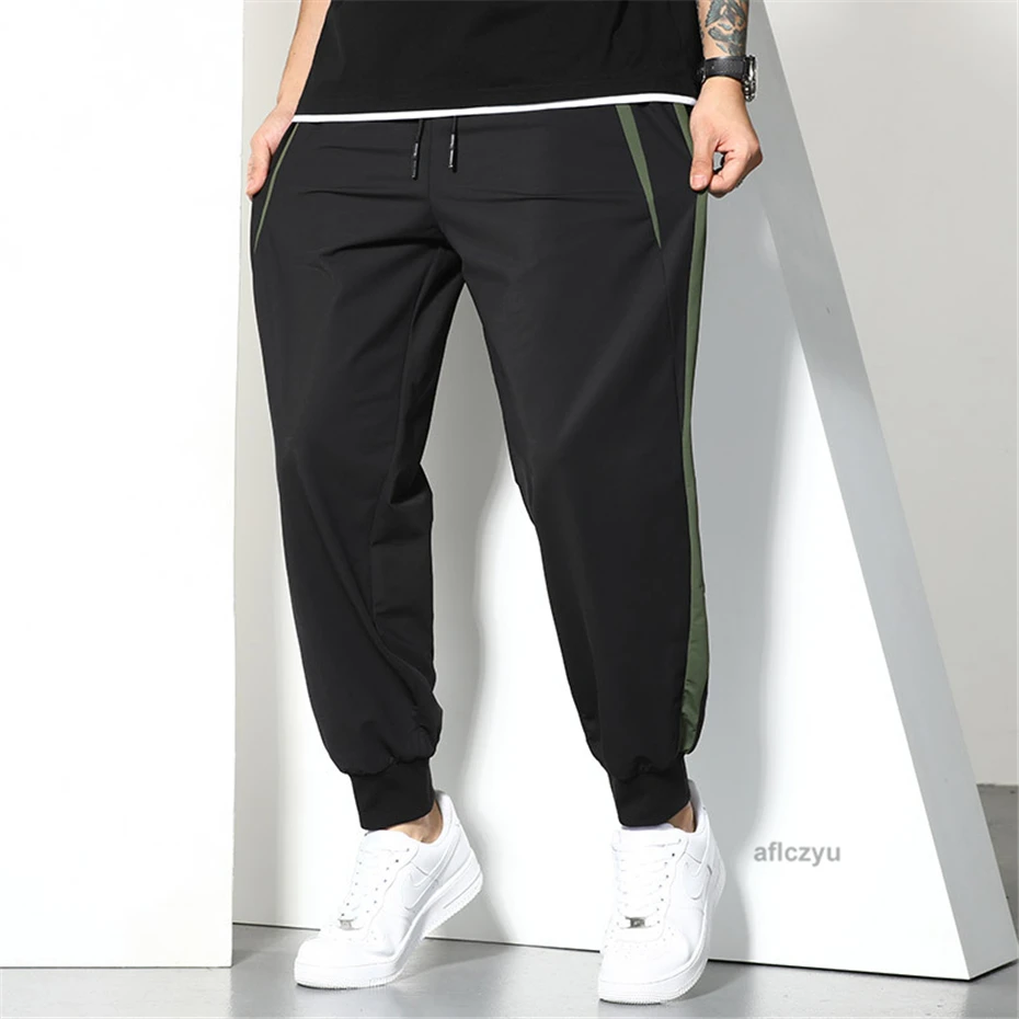 Schwarze Jogger hose Männer Sommer Baggy Hose plus Größe 6xl Mode lässig Patchwork Hose männlich unten groß 6xl