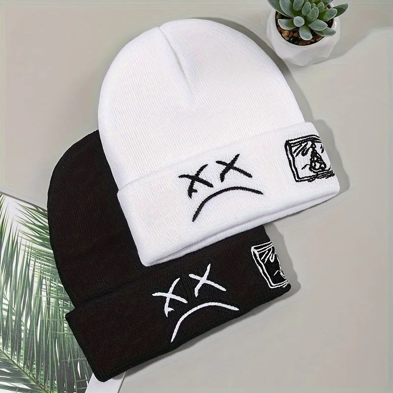 

Sad face embroidered graphic brimless casual hat fashionable black and white knitted hat casual skull hat hip-hop