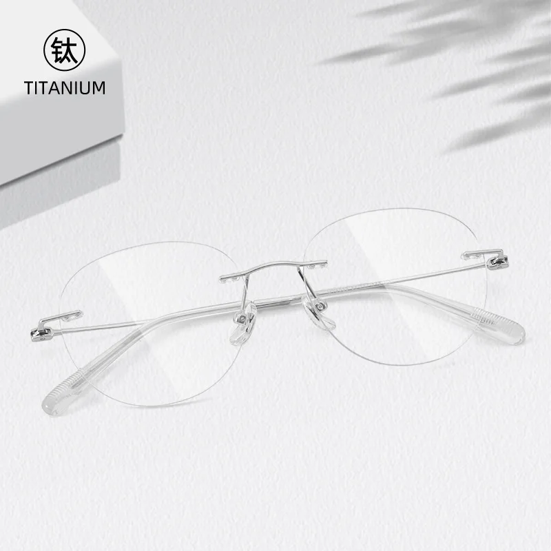 

Высококачественные очки из чистого титана, сверхлегкие безободковые оправы, модные очки для мужчин и женщин, унисекс.