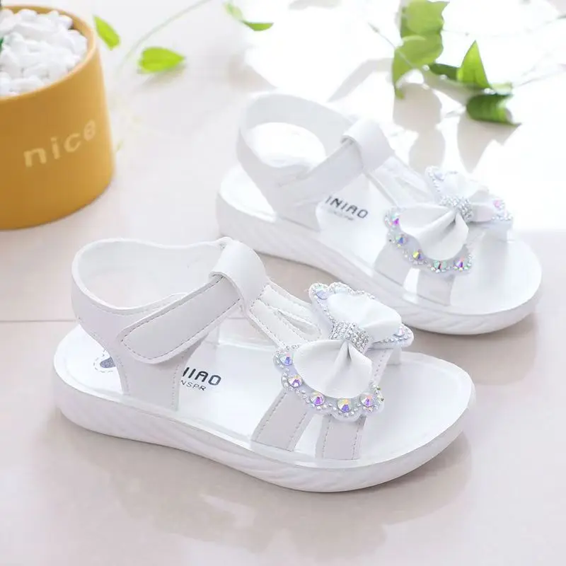 Summer New Girl Bowknot Princess Sandals Soft Sole Non Slip Open Toe Hollow Out Flat Sole Velcro Match Skirts Sandals