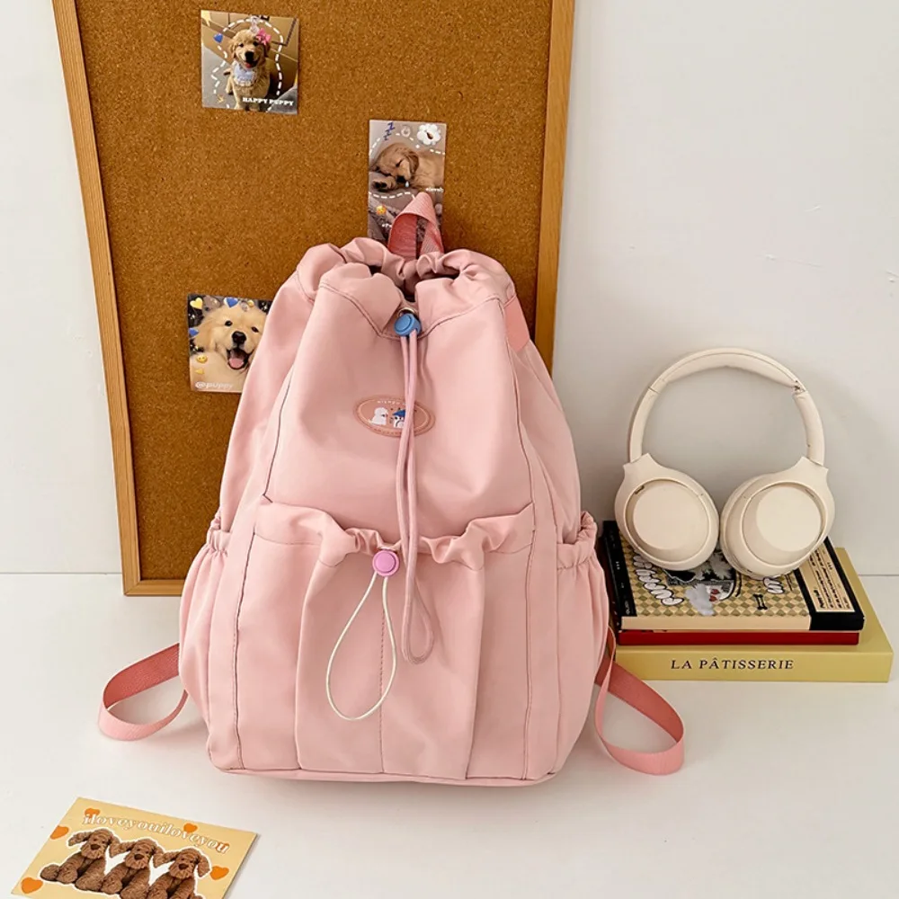 

New Large Capacity Drawstring Backpack with Pendant Solid Color School Bag Casual Portable Traveling Storage Bag