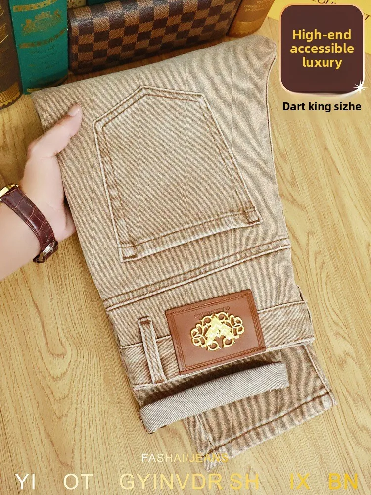 

Khaki jeans men in autumn and winter of 2025, high-end light luxury men's clothing, elastic small leg pants
