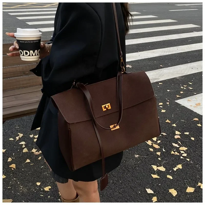 

Trendy Retro Satchel Bag With Letter Logo Textured Leather Also Serves As A Vintage Chic Diaper Bag For Party